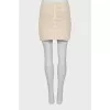Knitted mini skirt with tag