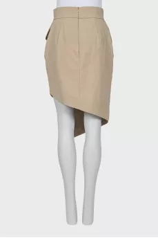 Skirt with pockets decorated with buttons