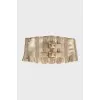 Belt made of leather and textile in gold color