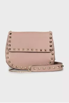 Leather bag decorated with spikes