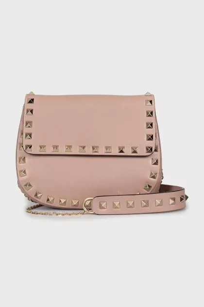 Leather bag decorated with spikes
