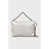 Leather bag decorated with tassel