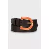Leather belt with orange buckle