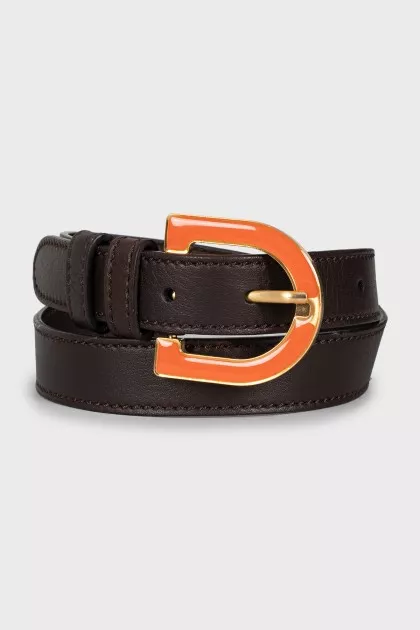 Leather belt with orange buckle