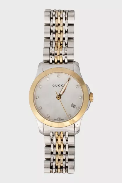 Watche with diamonds and mother of pearl