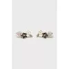 Earrings with brand logo decorated with crystals
