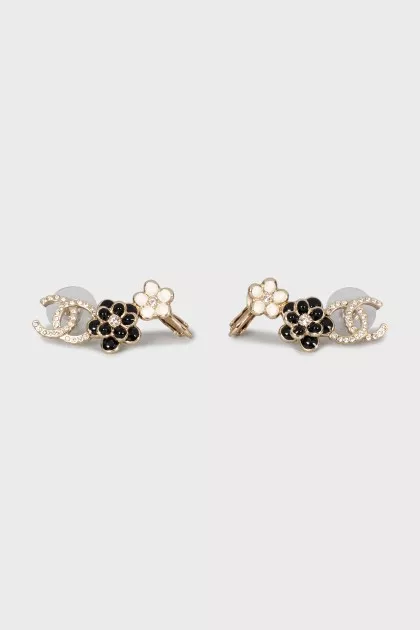 Earrings with brand logo decorated with crystals
