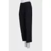 Wide trousers with arrows