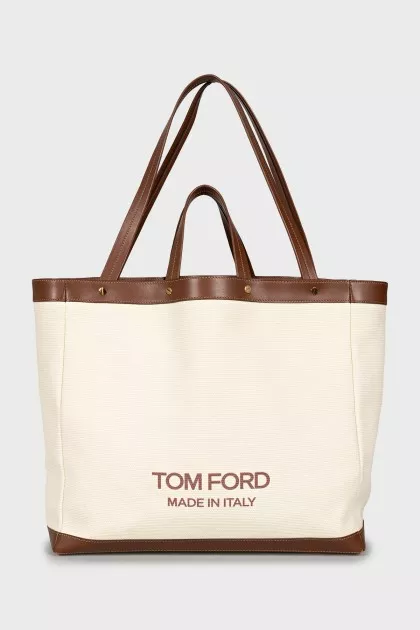 Bag with leather handles and signature print