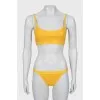 Orange swimsuit with tag