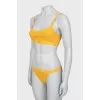 Orange swimsuit with tag