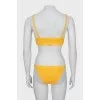 Orange swimsuit with tag