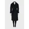 Coat decorated with bright stripes