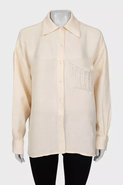 Shirt with patch knitted pocket