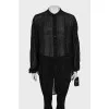 Black blouse decorated with rhinestones