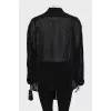 Black blouse decorated with rhinestones
