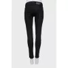 Skinny jeans with relief inserts