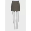 Mini skirt decorated with sequins with tag