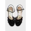 Vintage sandals decorated with flowers