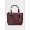 Leather bag with tag keychain