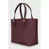 Leather bag with tag keychain