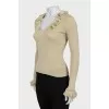 Jumper with frills on sleeves and collar