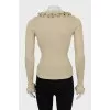 Jumper with frills on sleeves and collar