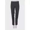 Trousers with red and black stripes on the sides