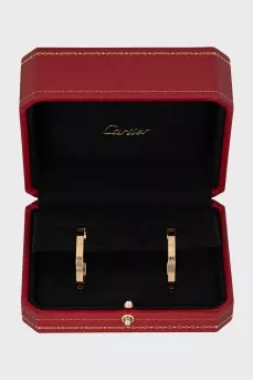 Gold stud earrings