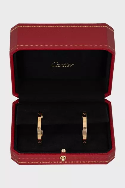 Gold stud earrings