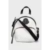 Backpack with patch pocket with tag