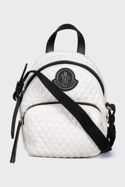 Backpack with patch pocket with tag