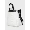Backpack with patch pocket with tag
