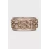 Gold bracelet decorated with chains