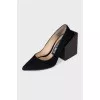 Suede shoes with a figured heel