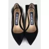Suede shoes with a figured heel