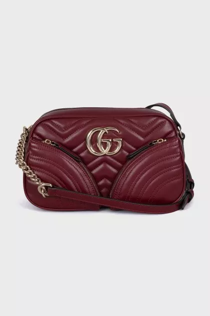Burgundy leather bag with tag