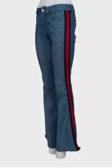 Flared jeans with contrasting side stripes