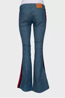 Flared jeans with contrasting side stripes