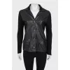 Leather jacket with silk sleeves