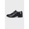 Leather loafers with metal decor
