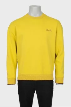 Men's yellow sweatshirt with brand logo