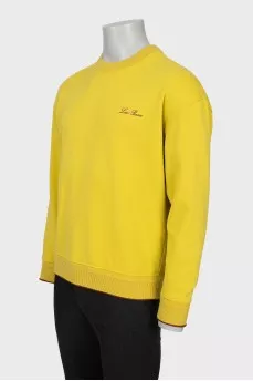 Men's yellow sweatshirt with brand logo