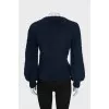 Dark blue sweater with brand logo