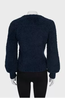 Dark blue sweater with brand logo