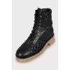 Quilted boots with embroidery on the toe