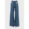 Flared jeans with raised seams