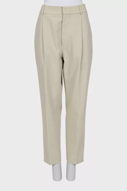 Beige trousers with a mid-rise