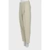 Beige trousers with a mid-rise