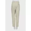 Beige trousers with a mid-rise